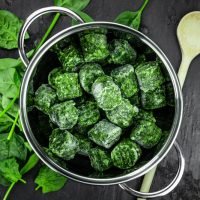 Portion,Of,Frozen,Spinach,As,Detailed,Close,Up,Shot,(selective