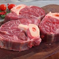 Three,Piece,Of,Beef,On,The,Cutting,Board