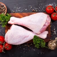 Fresh,Turkey,Legs,With,Ingredients,For,Cooking,On,Dark,Background,